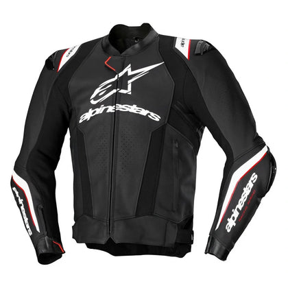 Rider wearing a fitted motorcycle jacket against a brick wall