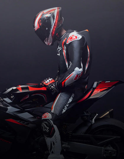 Sport riding style - rider in Alpinestars leathers on sportbike