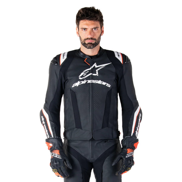 Rider wearing Alpinestars Missile V3 Ignition leather jacket black sport motorcycle gear front view
