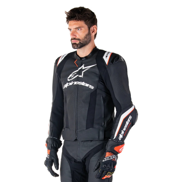 side view of Alpinestars Missile V3 Ignition leather jacket on rider aggressive riding posture