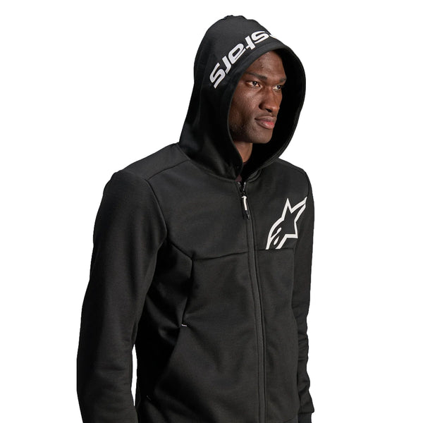 Rider wearing Alpinestars Chrome V2 sport hoodie black casual motorcycle gear front view