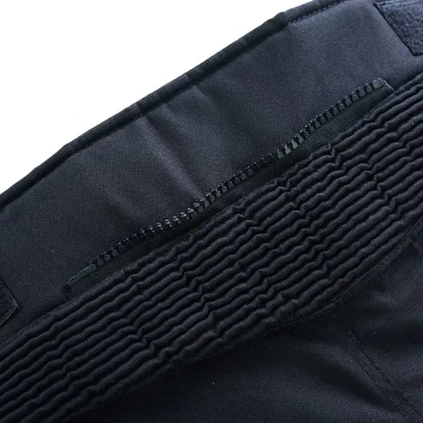 Stretch panel detail on Tuff Gear waterproof textile motorcycle pants
